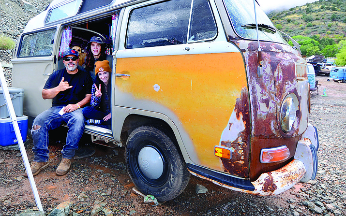 Max Ryniewicz, 21, his girlfriend Madi West, 23, and Andy Ryniewicz pose inside their 1970 Deluxe Safari High Top VW bus at the Jerome Jamboree on Thursday. The even runs through Sunday. VVN/Vyto Starinskas