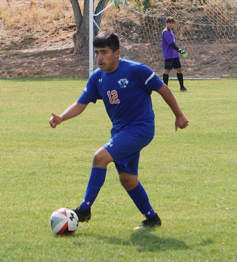 Chino Valley defender Jesus Ayala tries to find an open teammate during the team's 8-2 win over Desert Christian on Saturday, Sept. 28, 2019, at Chino Valley High School. (Aaron Valdez/Courier)