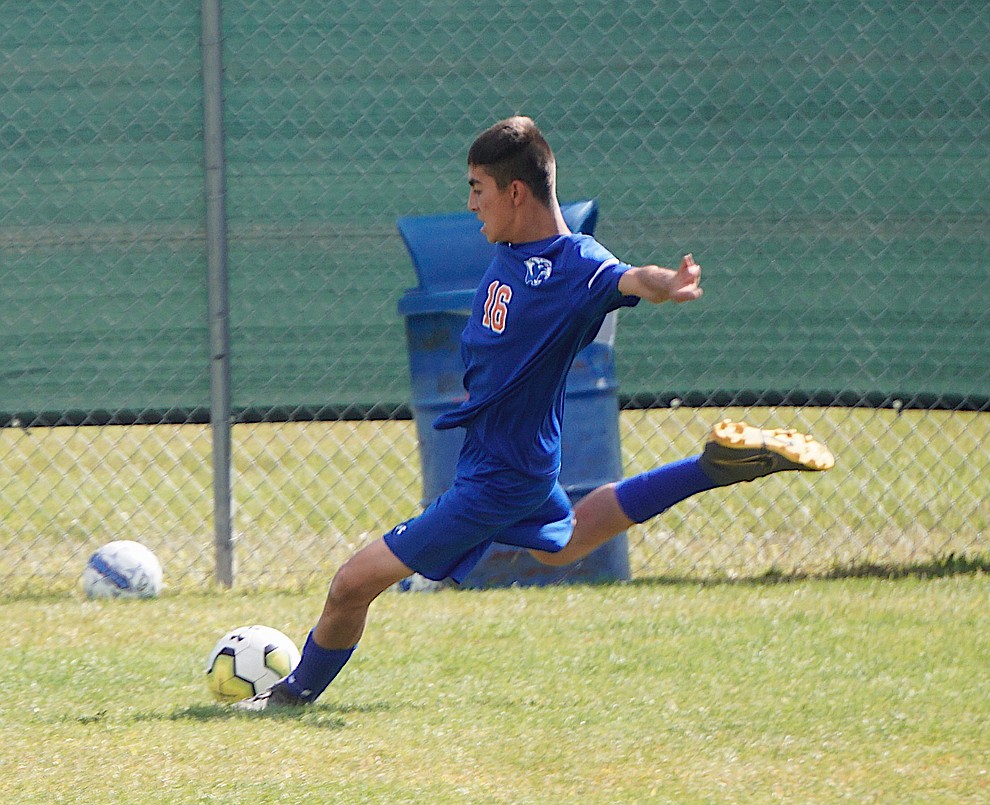Chino Valley defender Jose Sanchez kicks the ball down field during the team's 8-2 win over Desert Christian on Saturday, Sept. 28, 2019, at Chino Valley High School. (Aaron Valdez/Courier)