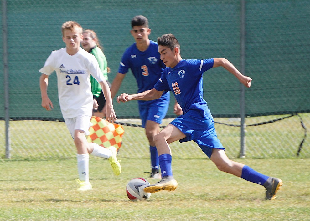 Chino Valley defender Jose Sanchez (16) dribbles down field during the team's 8-2 win over Desert Christian on Saturday, Sept. 28, 2019, at Chino Valley High School. (Aaron Valdez/Courier)