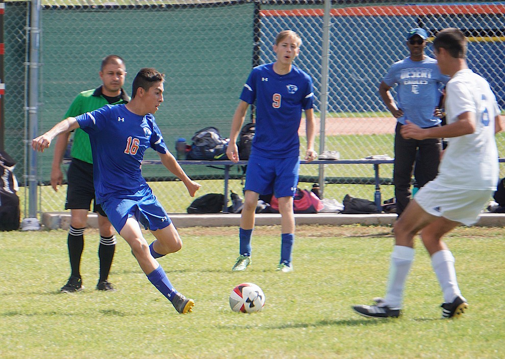 Chino Valley defender Jose Sanchez (16) attmepts to win a 50-50 ball during the team's 8-2 win over Desert Christian on Saturday, Sept. 28, 2019, at Chino Valley High School. (Aaron Valdez/Courier)