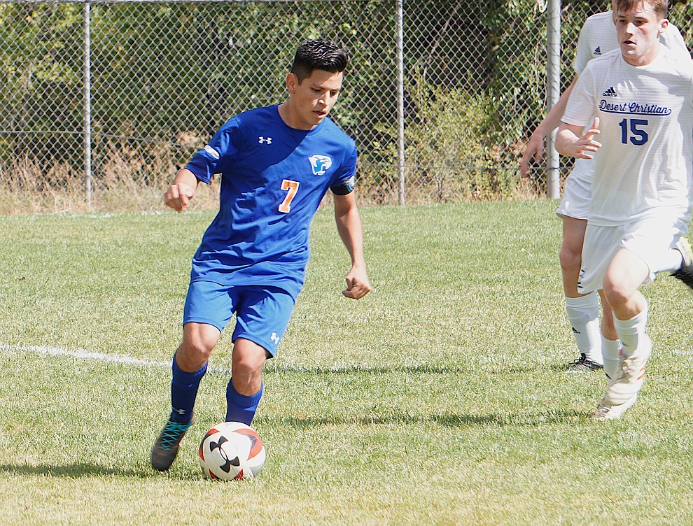 Chino Valley forward Irving Vedolla (7) probes the left flank during the team's 8-2 win over Desert Christian on Saturday, Sept. 28, 2019, at Chino Valley High School. (Aaron Valdez/Courier)