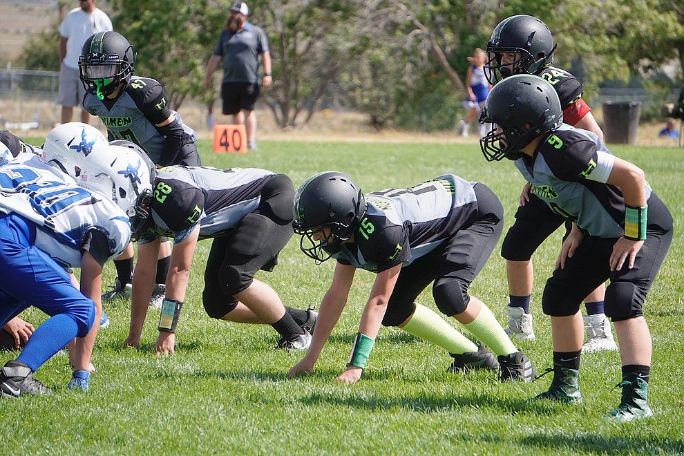 The Prescott Valley Hitmen Majors defense awaits the snap during their game against Bagdad on Saturday, Sept. 28, 2019, at Bradshaw Mountain Middle School. (Aaron Valdez/Courier)