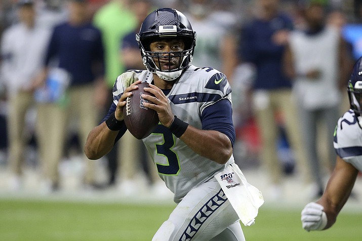Seattle Seahawks quarterback Russell Wilson (3) looks to throw against the Arizona Cardinals during the second half of a game, Sunday, Sept. 29, 2019, in Glendale, Ariz. (Ross D. Franklin/AP)