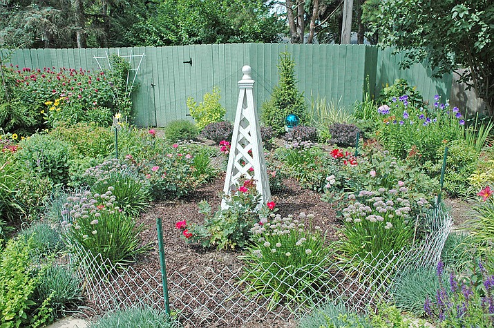 Fencing, when installed properly, can be an effective tool in protecting gardens against animal damage. (Melinda Myers, LLC/Courtesy)