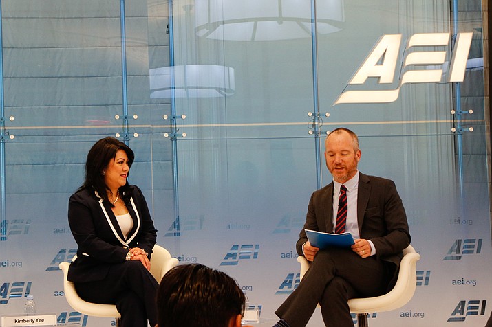 Arizona Treasurer Kimberly Yee talks about the state’s Empowerment Scholarship Account program with the American Enterprise Institute’s Nat Malkus at an AEI event about a federal school choice plan. (Amy-Xiaoshi DePaola/Cronkite News)