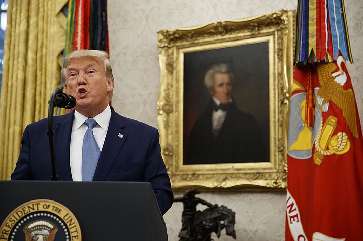 President Donald Trump speaks during a ceremony to present the Presidential Medal of Freedom to former Attorney General Edwin Meese, in the Oval Office of the White House, Tuesday, Oct. 8, 2019, in Washington. (Alex Brandon/AP)