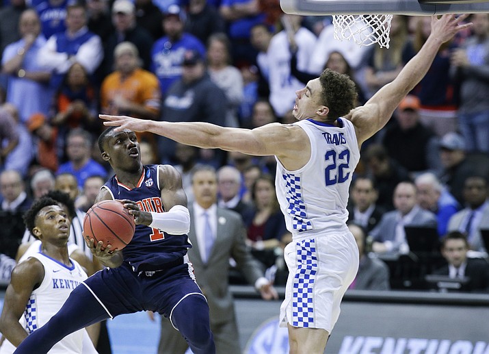 ABOVE PHOTO: Jared Harper (1) heads to the basket for Auburn as Kentucky’s Reid Travis (22) defends in the first half of Auburn’s Elite 8 matchup with the Wildcats March 31, 2019, in Kansas City. Harper signed a two-way contract and should see plenty of time in Prescott Valley as a member of the Northern Arizona Suns. (Charlie Riedel/AP, file)