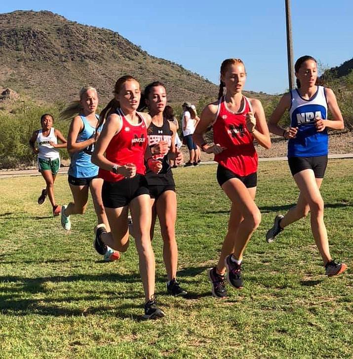 Mingus sophomores Claire Peterson and Aubrey Peterson finished in the top 12 in the frosh/soph race at the Thunderbird HS/Dave Doerrer Invitational in Phoenix on Saturday. Photo courtesy Marci Ahler.