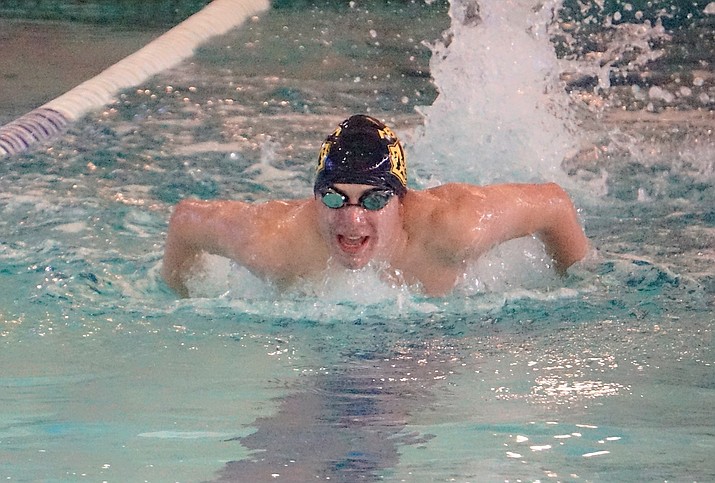 Prescott senior Matthew Grasso competes in the 100-yard butterfly event during a meet against Wickenburg on Thursday, Oct. 10, 2019, at the YMCA in Prescott. (Aaron Valdez/Courier)