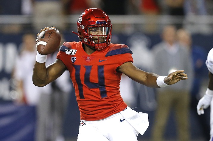 Arizona quarterback Khalil Tate looks to pass against Washington during the first half of an NCAA college football game Saturday, Oct. 12, 2019, in Tucson. (Rick Scuteri/AP, file)