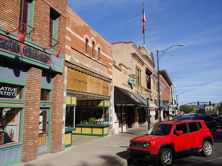 The Ian Russell Gallery on Whiskey Row in Prescott is undergoing a facelift to restore its façade to more closely resemble how the Block Building looked in the early 1900s. (Doug Cook/Courier)