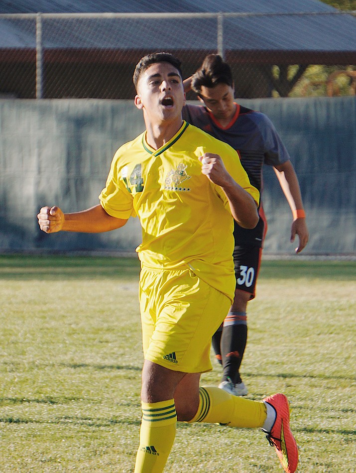 Yavapai midfielder Jonathan Mayen (14) celebrates after scoring his first goal in the Roughrider’s 2-1 win over Pima on Saturday, Oct. 19, 2019, at Ken Lindley Field. (Aaron Valdez/Courier)