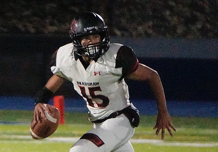 Bradshaw Mountain quarterback Moises Hernandez scrambles against Prescott on Oct. 11, 2019. Hernandez went out with an injury in the first half against Mohave on Friday, Oct. 25, 2019, but the Bears still beat the Thunderbirds 55-28. (Aaron Valdez/Courier, file)