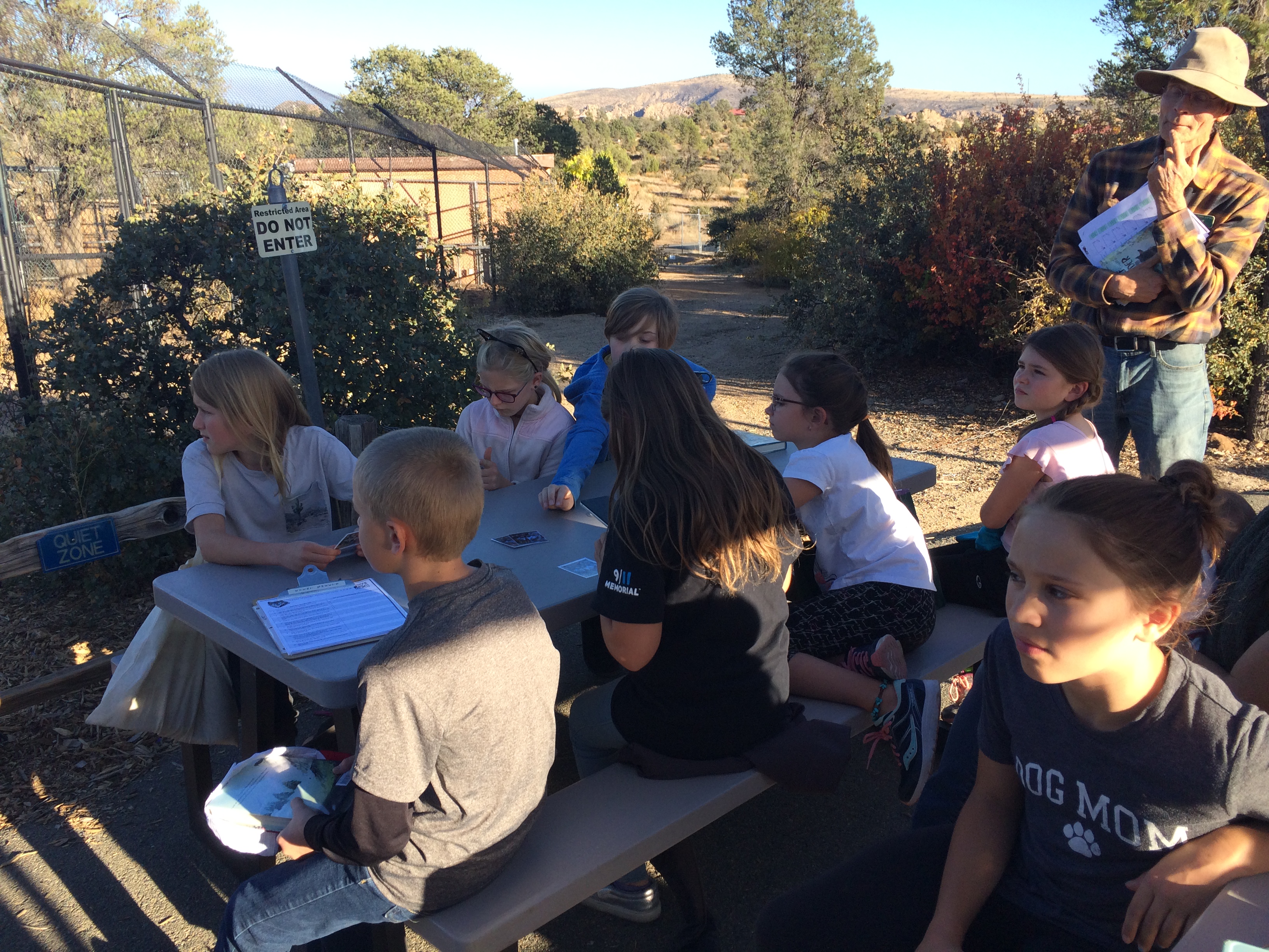 Through the eyes of the wolf Book club’s field trip to zoo reinforces