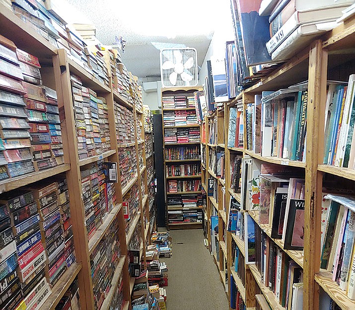 A booklover’s dream in downtown Prescott, all five aisles at The Book Nook used bookstore overflow with paperbacks and hardbacks. Notice the books neatly stacked on the floor at the base of the shelves! Store owner Marilyn Unruh wouldn’t have it any other way, offering fiction and non-fiction alike for her loyal customers. The Book Nook will close after 45 years in business at the end of December. (Doug Cook/Courier)