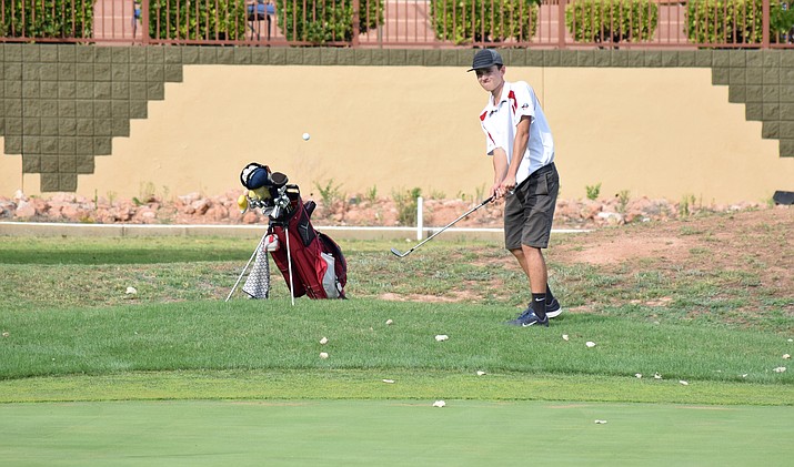 Mingus senior Noah Daher chips the ball into the hole on the ninth at Agave Highlands earlier this season. He got an eagle. VVN/James Kelley