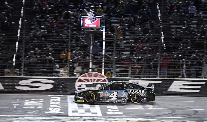 Kevin Harvick (4) crosses the finish line to win a NASCAR Cup Series auto race at Texas Motor Speedway, Sunday, Nov. 3, 2019, in Fort Worth, Texas. (Larry Papke/AP)