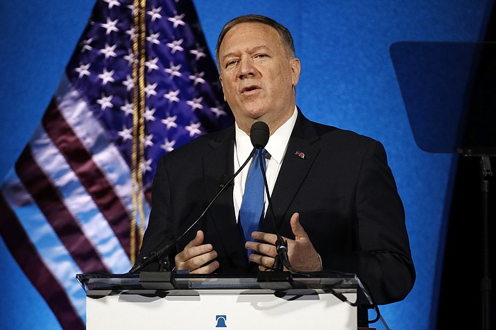 In this Oct. 22, 2019, file photo, Secretary of State Mike Pompeo speaks at the Heritage Foundation's annual President's Club Meeting in Washington. The United States has told the United Nations it has begun the process of pulling out of the landmark 2015 Paris climate agreement. Pompeo said Monday that he submitted a formal notice to the United Nations. (AP Photo/Patrick Semansky, File)