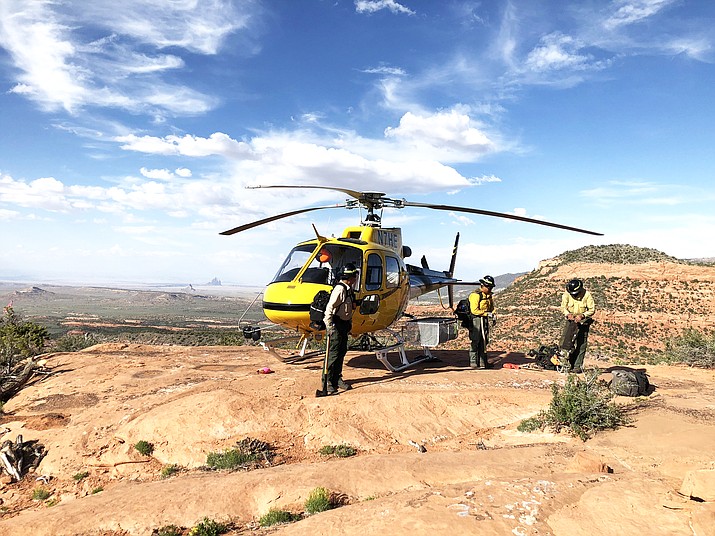 Navajo Helitack crewmembers load the helicopter after a hard day work at a local fire. (Photos courtesy of Navajo Helitack Program)