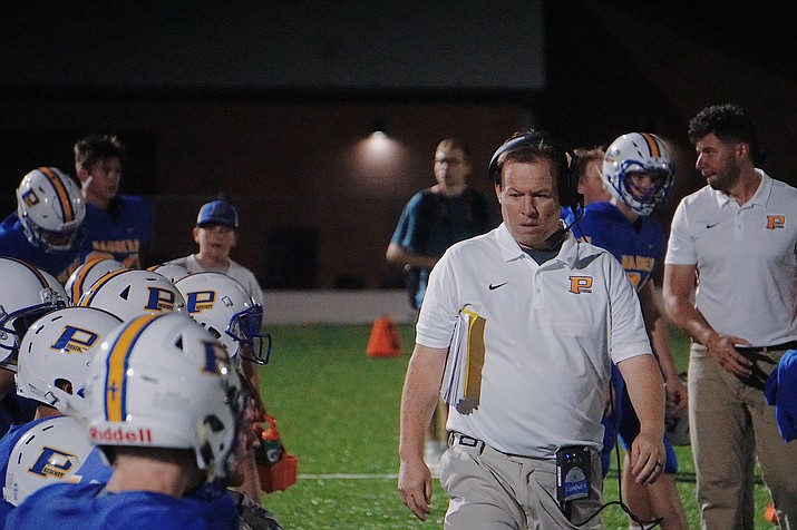 Prescott head coach Cody Collett walks along the sideline during the Badgers' 48-7 win over Flagstaff on Friday, Sept. 20, 2019, at Bill Shepard Field in Prescott. (Aaron Valdez/Courier, file)