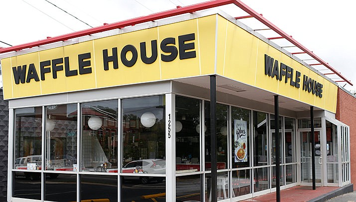 Waffle House is known to not close for anything - even if there’s only one worker behind the counter. (Joshua L. Jones/Athens Banner-Herald via AP)