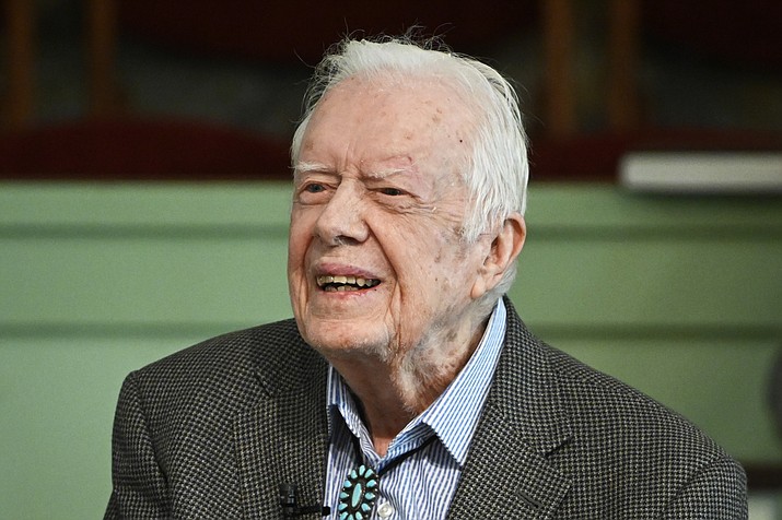 In this Sunday, Nov. 3, 2019, photo, former President Jimmy Carter teaches Sunday school at Maranatha Baptist Church in Plains, Ga. Carter was admitted to Emory University Hospital for a procedure to relieve pressure on his brain, caused by bleeding due to his recent falls. A spokeswoman said Tuesday morning, Nov. 12, all went well. (John Amis/AP)