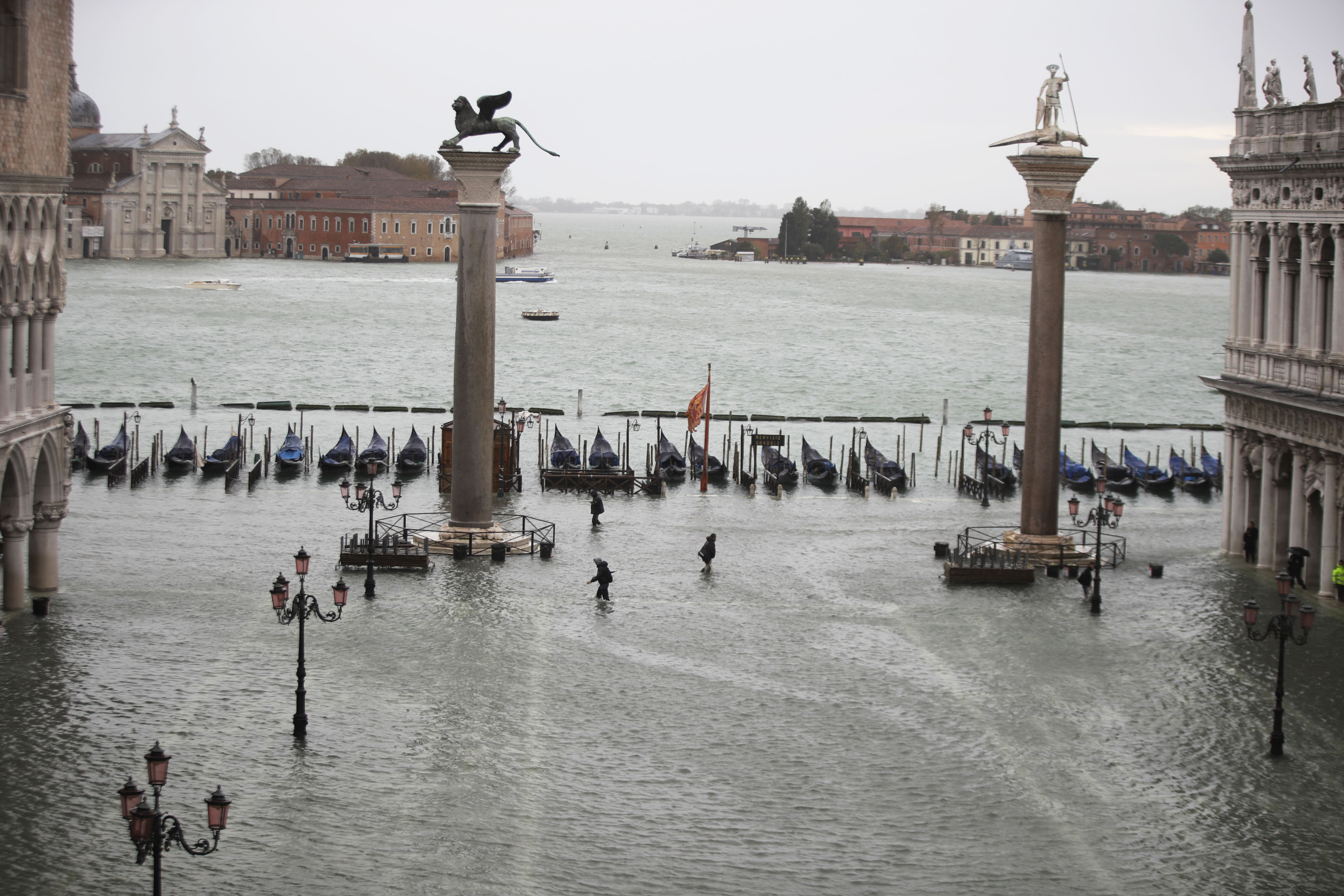 High tides surge through Venice, locals rush to protect art The Daily