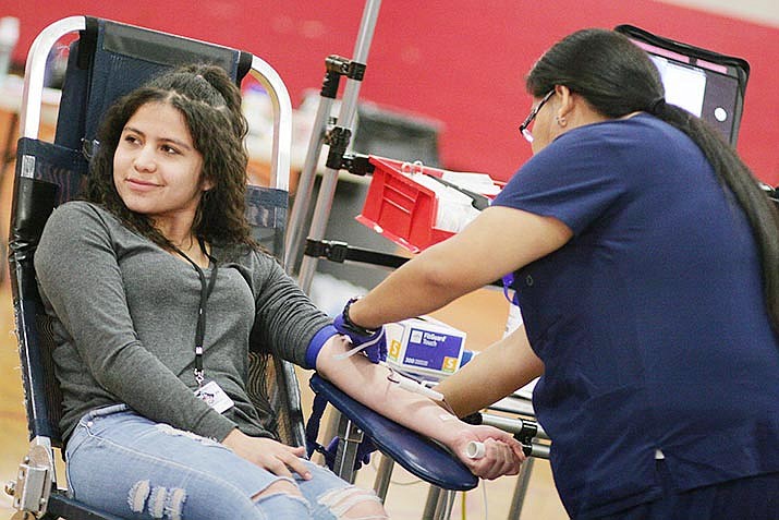 Tuesday, Nov. 19, Mingus Union junior Jaqueline Bedolla gives blood for her first time, in the school’s small gymnasium. Bedolla was one of 71 Mingus Union students scheduled to give blood at the blood drive, a partnership between the school and Vitalant. VVN/Bill Helm