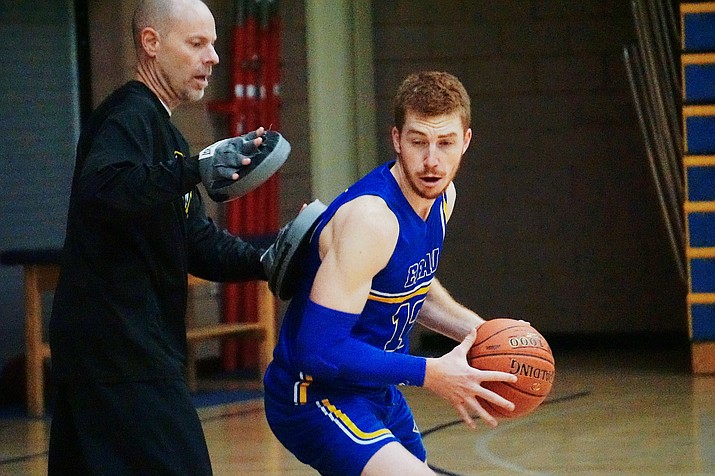 Embry-Riddle guard Nick Johnson (12) works on his post moves during the team’s practice on Monday, November 25, 2019, at the Embry-Riddle Activity Center in Prescott. (Aaron Valdez/Courier)