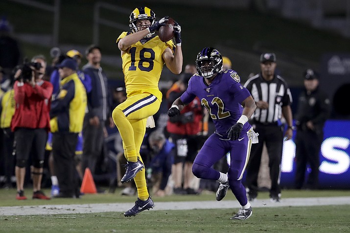 Los Angeles Rams wide receiver Cooper Kupp catches a pass in front of Baltimore Ravens cornerback Jimmy Smith during the second half Monday, Nov. 25, 2019, in Los Angeles. (Marcio Jose Sanchez/AP)
