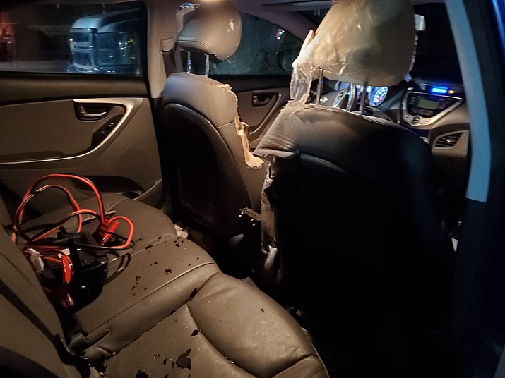 This Friday, Nov. 22, 2019 photo provided by Alyssa Brenteson shows damage to a car vandalized by a bear while it was parked in the Island Air terminal parking lot adjacent to the Kodiak Benny Benson State Airport in Kodiak, Alaska. (Alyssa Brenteson via AP)