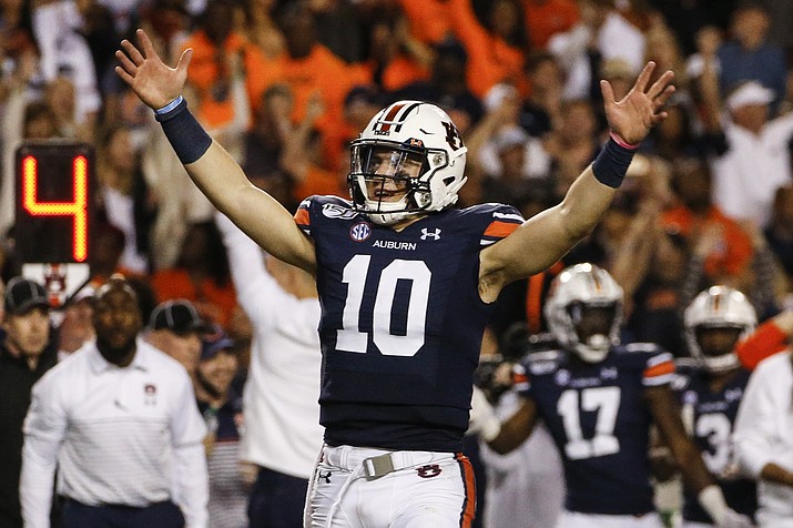 Auburn quarterback Bo Nix reacts after a penalty gave Auburn a first down and secured the win over Alabama during the second half of a game Saturday, Nov. 30, 2019, in Auburn, Ala. Auburn won 48-45. (Butch Dill/AP)