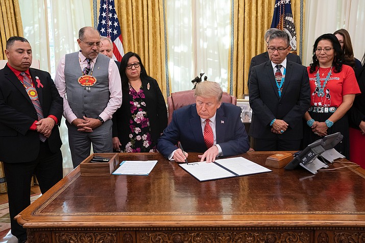 Navajo Nation Vice President Myron Lizer and Second Lady Dottie Lizer look on as U.S. President Donald Trump signs a Missing and Murdered Indigenous Person Executive Order to help combat the national crisis affecting tribes across the U.S. Nov. 26. (Official White House photos/Joyce N. Boghosian)