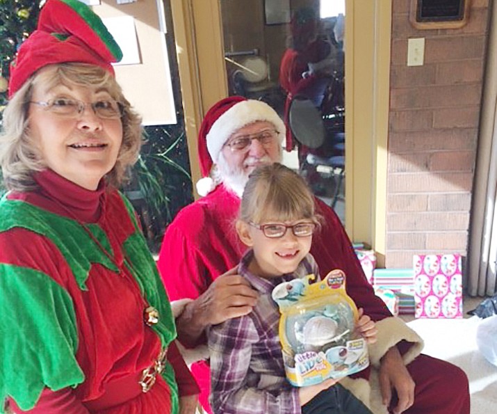 Santa Clause visits with a young child in Chino Valley in 2017. From 10 a.m. to 2 p.m. Saturday, Dec. 7, 2019, Santa and Mrs. Claus will be at the Chino Valley Community Center. (Review file photo)