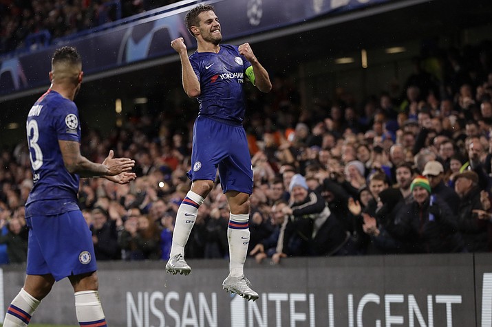 Chelsea’s Cesar Azpilicueta celebrates scoring his side’s 2nd goal during the Champions League Group H match between Chelsea and Lille at Stamford Bridge stadium in London Tuesday, Dec. 10, 2019. (Kirsty Wigglesworth/AP)