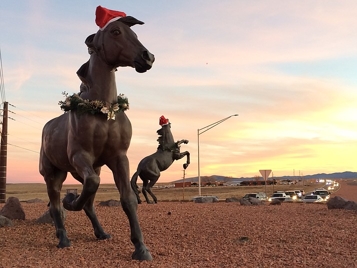 Lock, Stock & Barrel, the horse statues at the roundabout on Highway 89 separating Outer Loop Road and Road 4 South decorated for Christmas. (Jason Wheeler/Courier)