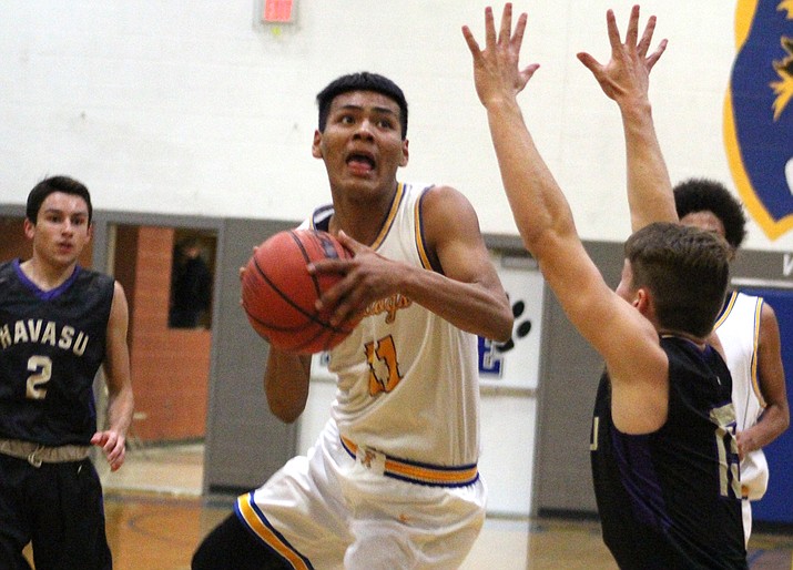 Kingman’s Rider Havatone tallied 23 points Friday in a 74-68 loss to ALA-Ironwood. (Miner file photo)