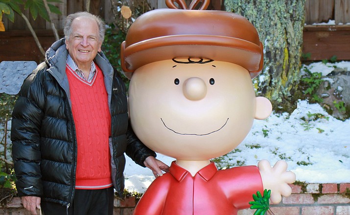 This 2015 photo provided by Jason Mendelson shows Lee Mendelson in Hillsborough, Calif. Lee Mendelson, the producer who changed the face of the holidays when he brought “A Charlie Brown Christmas” to television in 1965 and wrote the lyrics to its signature song, “Christmas Time Is Here,” died on Christmas day, Wednesday, Dec. 25, 2019. (Jason Mendelson via AP)