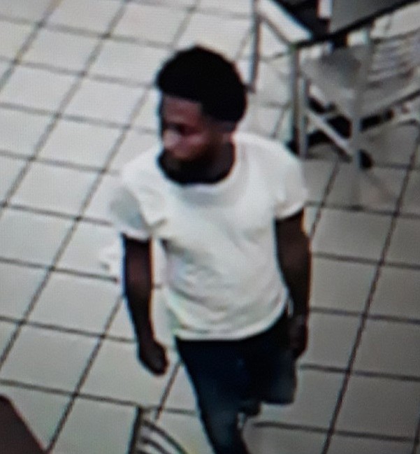 This image provided by the Lafourche Parish Sheriff Office shows a suspect inside a convenience store in Galliano, La. Louisiana authorities are trying to identify a man who left apparent designer bags holding drugs, a gun, cash and a digital scale in a convenience store. The man went into the store early Thursday, Jan. 2, 2020 and put the apparent Louis Vuitton and Gucci bags on a chair, according to a news release. (Lafourche Parish Sheriff Office)