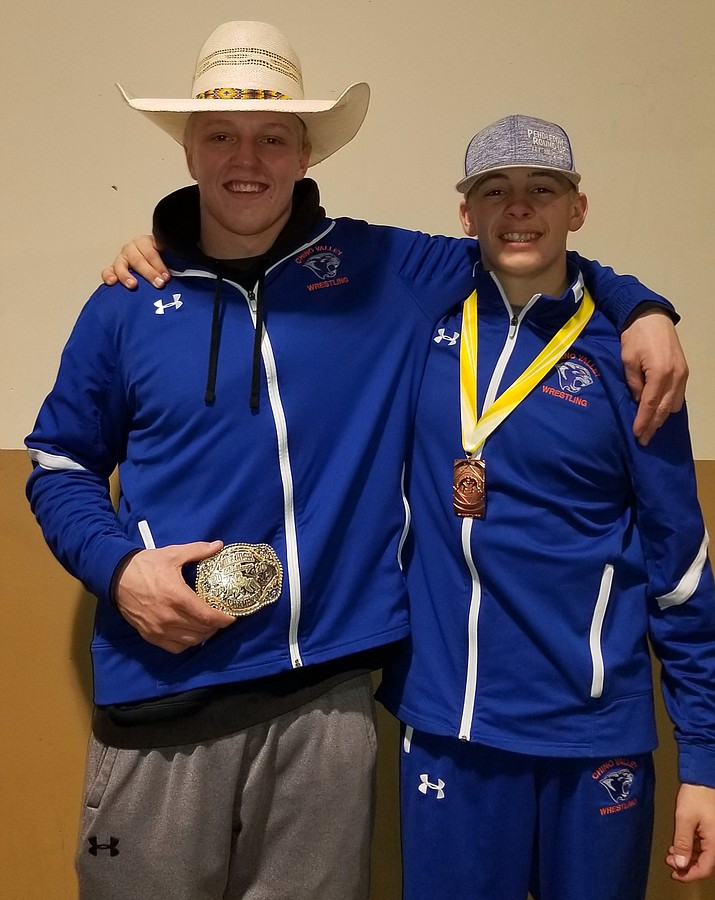 Chino Valley’s Keller Rock, left, and Colby Evens hold up their awards after respectively placing first and fourth in the Mile High Challenge wrestling tournament on Saturday, Jan. 4, 2020, at the Findlay Toyota Center in Prescott Valley. (Kevin Giese/Courtesy)