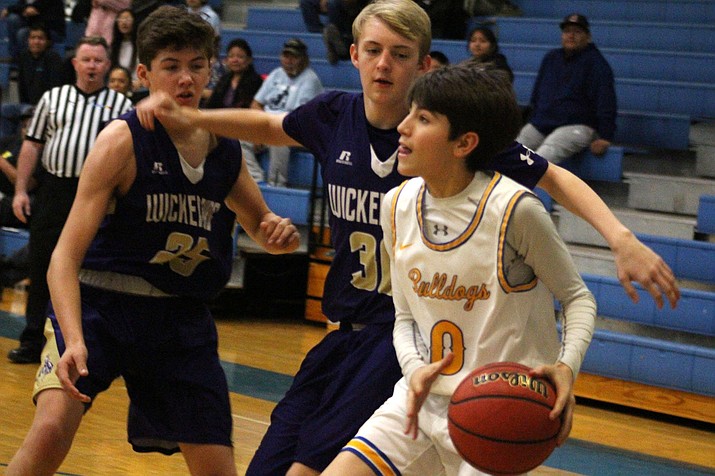Kingman sophomore Garrett Stryker tallied 14 of the Bulldogs' 23 bench points Thursday in a 72-43 victory over Wickenburg. (Photo by Beau Bearden/Kingman Miner)