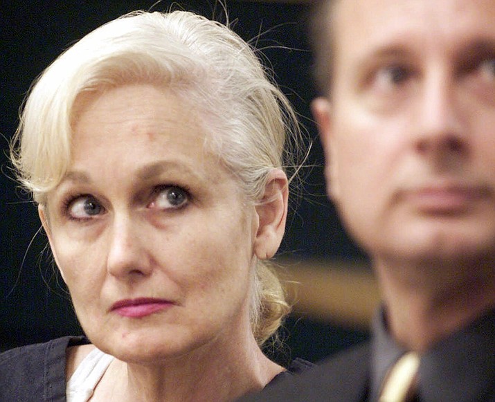 In this Feb. 22, 2001 photo, Margaret Rudin, left, with her attorney Michael Amador, attends a hearing in Clark County District Court in Las Vegas. On Friday, Jan. 10, 2020, Rudin was released from prison, more than 25 years after her millionaire husband's burned body was found outside Las Vegas and 20 years after a tip generated by a "most wanted" TV show led to her arrest while living in Massachusetts with a retired firefighter she met in Mexico. (Las Vegas Sun, Aaron Mayes/AP, File)