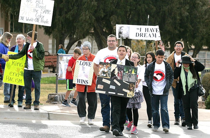 Chandler Plante leads a Martin Luther King, Jr. march down Main Street in Camp Verde. For the ninth consecutive year, Plante, now 14, brings attention to Dr. King’s message. VVN/Bill Helm