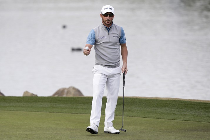 Andrew Landry reacts after a birdie putt on the 18th hole to win The American Express golf tournament on the Stadium Course at PGA West in La Quinta, Calif., Sunday, Jan. 19, 2020. (AP Photo/Alex Gallardo)