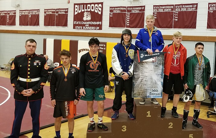 Chino Valley wrestler Keller Rock, third from right, stands on the podium after he took first place at the Doc Wright Invitational from Friday, Jan. 17 to Saturday, Jan. 18, 2020, in Winslow. (Kevin Giese/Courtesy)