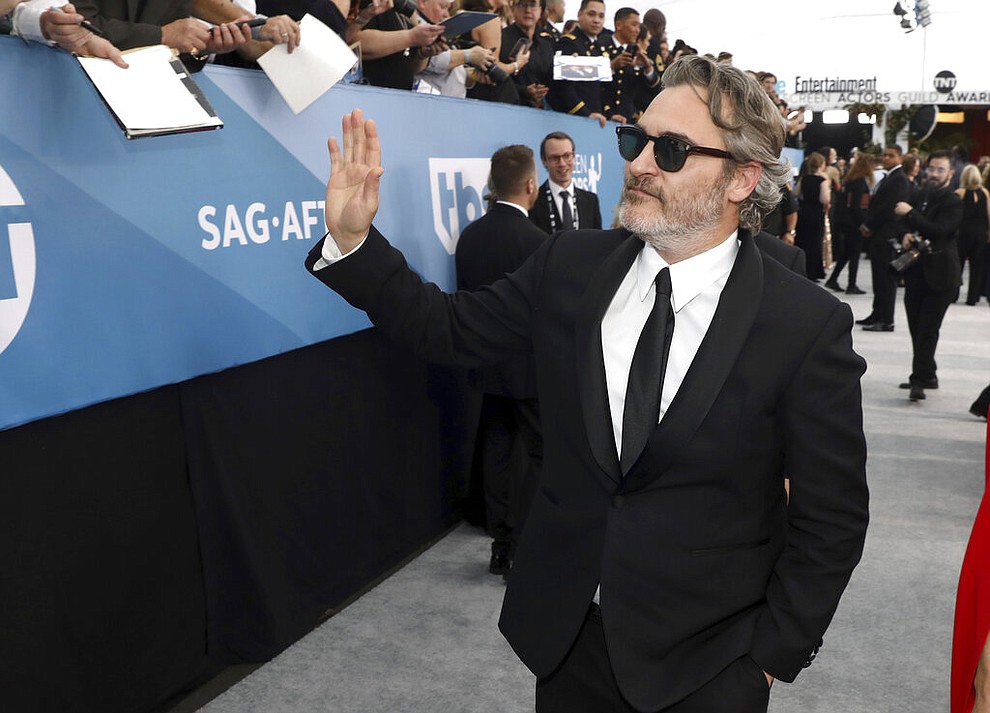 Joaquin Phoenix arrives at the 26th annual Screen Actors Guild Awards at the Shrine Auditorium & Expo Hall on Sunday, Jan. 19, 2020, in Los Angeles. (Photo by Matt Sayles/Invision/AP)
