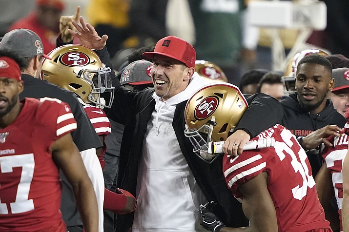 San Francisco 49ers head coach Kyle Shanahan, center, celebrates with players during the second half of the NFL NFC Championship football game against the Green Bay Packers Sunday, Jan. 19, 2020, in Santa Clara, Calif. The 49ers won 37-20 to advance to Super Bowl 54 against the Kansas City Chiefs. (Tony Avelar/AP)