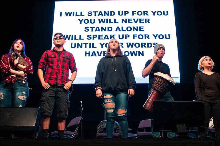 High school students perform the premiere of musical “I Will Stand Up for You” at the fourth annual Speak Up, Stand Up, Save a Life Conference at Grand Canyon University. The one-act musical—by the UBU Project—aims to connect students on a peer-to-peer level so they can learn to empathize with each other and be open to talking about mental health. (Delia Johnson/Cronkite News)