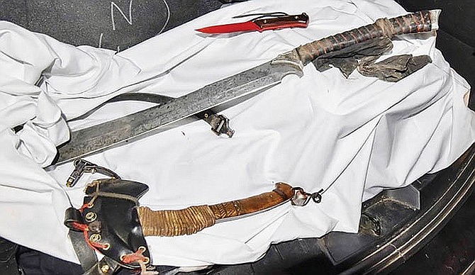 The Sedona Police Department released this photo Wednesday, Jan. 22, 2020, of weapons they say were in the possession of Jonathan David Messare, 41, when he was killed in an officer-involved shooting Jan. 20. (Sedona Police/Courtesy)